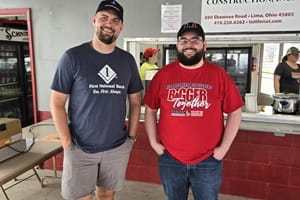 First National Bank of Pandora Employees standing in food tent at fair